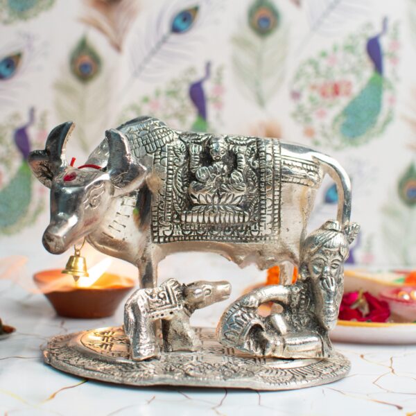 Metal cow with Krishna - Image 2