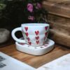 Red Heart cup with saucer